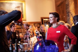 Christel conversing in a bar